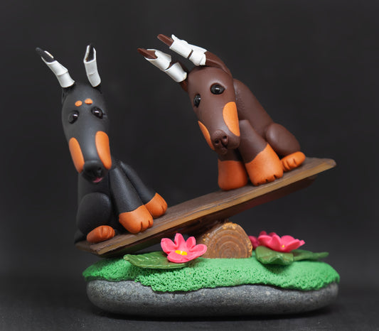 Doberman Seesaw Figurine